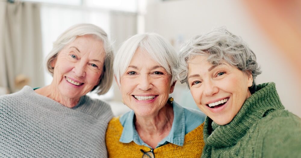 Senior women smiling at their independent senior living