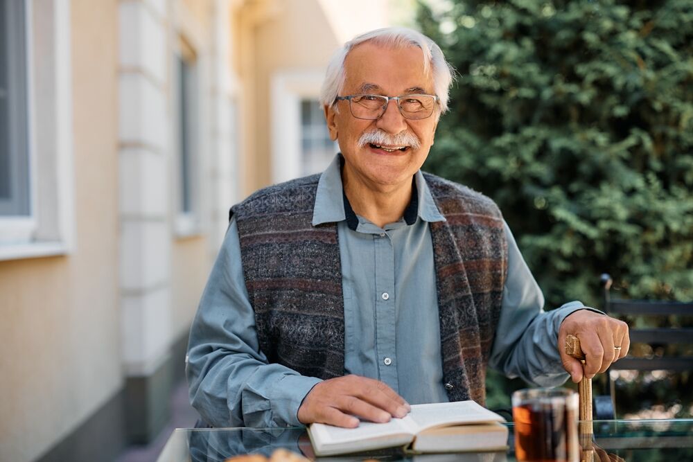 Smiling senior man in independent living in San Diego.