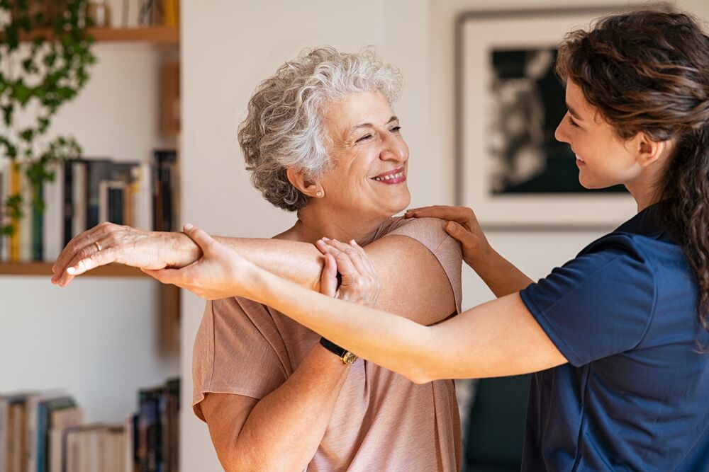 Woman stretching in skilled nursing in San Diego.