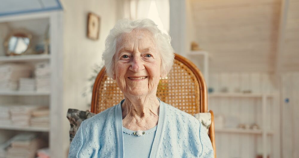 A senior woman inside enjoying Assisted Living San Diego CA
