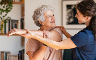 Woman stretching in skilled nursing in San Diego.